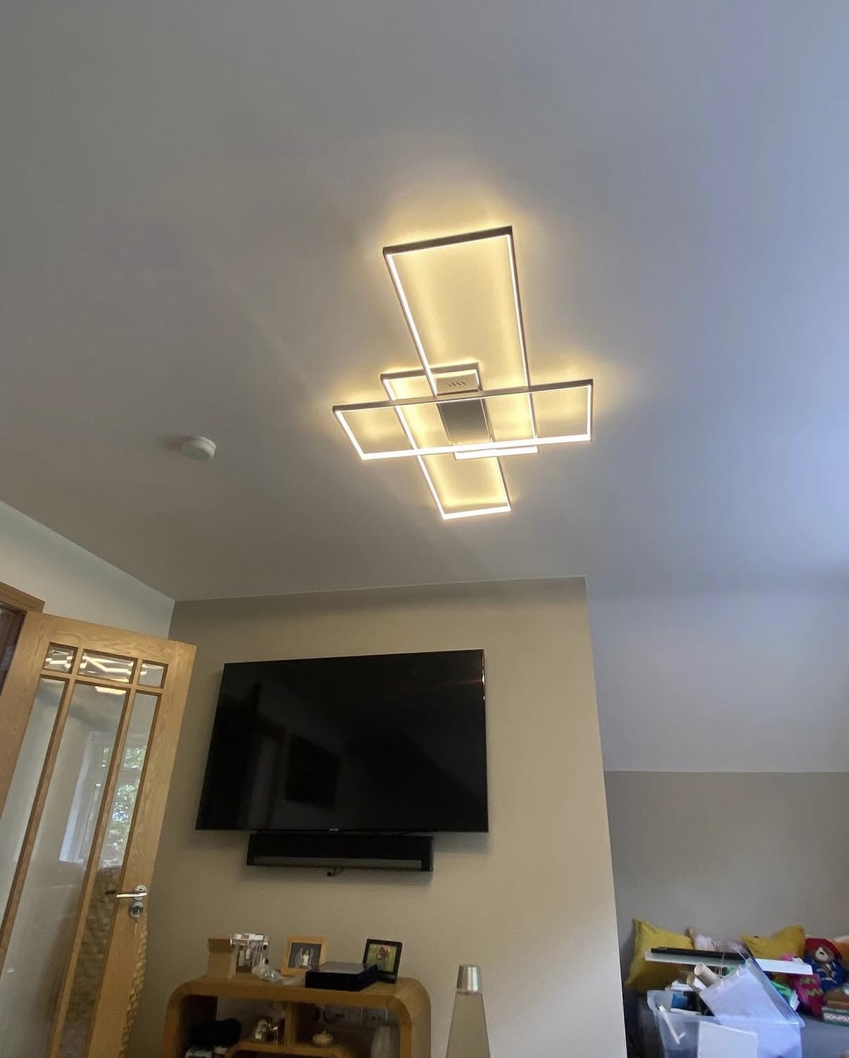 Finished living room with recessed ceiling lighting in Toronto