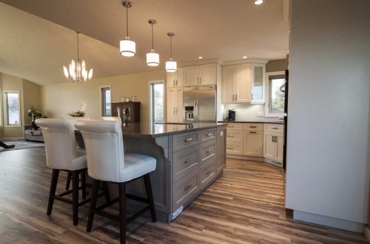 Modern kitchen with under-cabinet and recessed ceiling lighting